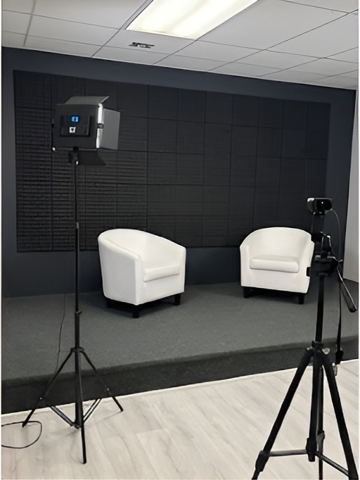 Stage with interview chairs and studio light